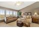 Inviting main bedroom features a seating area and large windows with shutters at 15755 E Palomino Blvd, Fountain Hills, AZ 85268