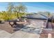 Well-kept home with a tile roof, desert landscaping, and a spacious driveway at 16292 N Naegel Dr, Surprise, AZ 85374