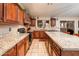 Well-appointed kitchen with granite countertops and stainless steel appliances offering both style and functionality at 16292 N Naegel Dr, Surprise, AZ 85374