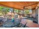 Outdoor patio featuring comfortable seating and a ceiling fan for relaxed living at 16292 N Naegel Dr, Surprise, AZ 85374