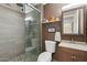 Modern bathroom with tiled shower, updated fixtures, vanity, and contemporary design elements at 17234 N Paradise Park Dr, Phoenix, AZ 85032
