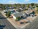 Aerial view of a single-story home with a desert landscape and a two car garage at 17234 N Paradise Park Dr, Phoenix, AZ 85032