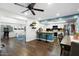Open kitchen with stainless steel appliances, a kitchen island and adjacent seating area at 17234 N Paradise Park Dr, Phoenix, AZ 85032