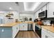 Well-equipped kitchen with stainless steel appliances and bright lighting at 17234 N Paradise Park Dr, Phoenix, AZ 85032