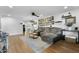 Spacious living room with modern decor, including a plush sectional sofa at 17234 N Paradise Park Dr, Phoenix, AZ 85032