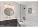 Elegant bathroom featuring a tub, sleek vanity, and stylish fixtures and gold hardware at 1949 E Oxford Dr, Tempe, AZ 85283