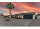 Single-story home with updated garage door, desert landscaping, and well-kept front yard at 1949 E Oxford Dr, Tempe, AZ 85283