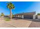 Single-story home with updated garage door, desert landscaping, and well-kept front yard at 1949 E Oxford Dr, Tempe, AZ 85283