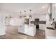 Bright modern kitchen with an island, stainless steel appliances, and stylish pendant lighting at 1949 E Oxford Dr, Tempe, AZ 85283