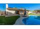 Outdoor living space with a refreshing pool, a patio, and a manicured yard creating a private retreat at 1949 E Oxford Dr, Tempe, AZ 85283