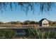 Scenic view of the Union Park entrance with desert landscaping and mountain backdrop on a sunny day at 1970 W Lariat Ln, Phoenix, AZ 85085