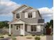 Charming two-story home with white trim, shutters, well-manicured landscaping, and neutral color palette at 1970 W Lariat Ln, Phoenix, AZ 85085