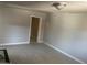 Bedroom featuring neutral colors, and a door to an adjoining room with hard surface flooring at 2010 N 38Th Ave, Phoenix, AZ 85009
