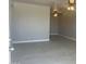 Open-concept living area with neutral paint, tile floors, and ceiling fans for added comfort at 2010 N 38Th Ave, Phoenix, AZ 85009