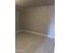 An empty room with tiled floors, offering a blank canvas for customization and design, full of potential at 2010 N 38Th Ave, Phoenix, AZ 85009