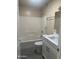 Bathroom with tub shower and vanity with marble countertop at 20625 N 104Th Ave, Peoria, AZ 85382