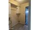 Laundry room with tile flooring and cabinetry at 20625 N 104Th Ave, Peoria, AZ 85382