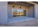 Covered patio with mountain views through sliding doors, perfect for enjoying the outdoors at 21422 W Meadowbrook Ave, Buckeye, AZ 85396
