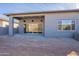 Covered patio with recessed lighting, sliding glass doors, and mountain views, great for outdoor entertaining at 21422 W Meadowbrook Ave, Buckeye, AZ 85396