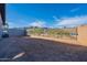 Large backyard with a block wall and mountain views, ready for your custom landscape design at 21422 W Meadowbrook Ave, Buckeye, AZ 85396
