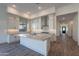Kitchen with island and white cabinets at 21422 W Meadowbrook Ave, Buckeye, AZ 85396