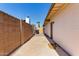 View of the backyard that features a concrete area and a block wall along the edge at 2223 W 8Th Ave, Mesa, AZ 85202
