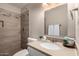 The bathroom features a tiled shower and granite countertops at 2223 W 8Th Ave, Mesa, AZ 85202