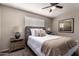 Serene main bedroom with soft lighting, comfortable bed, and stylish decor at 2223 W 8Th Ave, Mesa, AZ 85202