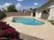 Refreshing pool with beautiful landscaping and sunny skies perfect for outdoor enjoyment at 2223 W 8Th Ave, Mesa, AZ 85202