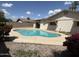 Inviting pool with a well-maintained deck and manicured landscaping at 2223 W 8Th Ave, Mesa, AZ 85202