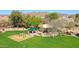 Beautiful park featuring playground, picnic areas and abundant green space, ideal for outdoor activities at 2411 W Oberlin Way, Phoenix, AZ 85085