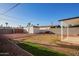 Large backyard with gravel, grass and a storage shed at 2938 N 15Th Ave, Phoenix, AZ 85015