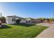 Beautiful house featuring a green lawn and a driveway leading to the front of the home at 2938 N 15Th Ave, Phoenix, AZ 85015