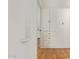 Hallway featuring built-in storage and hardwood floors at 2938 N 15Th Ave, Phoenix, AZ 85015