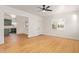 Bright living room featuring hardwood floors, ceiling fan, and an open floor plan at 2938 N 15Th Ave, Phoenix, AZ 85015