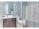 This bathroom features a shower-tub combo and single sink vanity at 3526 N Hudson Dr, Florence, AZ 85132