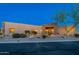 Desert home features a front yard with xeriscaping and a stone accent entry at 37015 N 27Th Pl, Cave Creek, AZ 85331