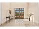 Welcoming home foyer with double glass doors and decorative tile flooring at 37015 N 27Th Pl, Cave Creek, AZ 85331