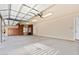 Spacious garage with ample storage cabinets, offering parking and organizational solutions at 37015 N 27Th Pl, Cave Creek, AZ 85331