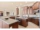Gourmet kitchen featuring granite countertops, stainless steel appliances, and custom cabinetry at 37015 N 27Th Pl, Cave Creek, AZ 85331