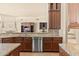 Kitchen featuring stainless steel appliances, custom cabinetry and granite counters at 37015 N 27Th Pl, Cave Creek, AZ 85331
