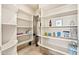 Spacious walk-in pantry with ample shelving for storage at 37015 N 27Th Pl, Cave Creek, AZ 85331
