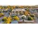 Beautiful backyard with a pool, manicured lawn, desert landscaping, and multiple entertaining areas at 40108 N 2Nd Way, Phoenix, AZ 85086
