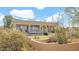 Backyard with a covered patio, desert landscaping, and a stucco wall at 40108 N 2Nd Way, Phoenix, AZ 85086