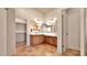 Spacious bathroom with double sinks, tile floor, and walk-in closet at 40108 N 2Nd Way, Phoenix, AZ 85086