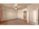 Bedroom featuring a ceiling fan, ensuite bathroom, and relaxing neutral tones at 40108 N 2Nd Way, Phoenix, AZ 85086