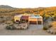 Exterior view of a stucco home with a red tile roof, desert landscaping, and mountain views at 40108 N 2Nd Way, Phoenix, AZ 85086