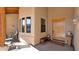 Inviting front porch with a wooden door, bench, and decorative accents creating a warm welcome at 40108 N 2Nd Way, Phoenix, AZ 85086