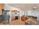 Modern kitchen with granite countertops, stainless steel appliances, and ample cabinet space for storage at 40108 N 2Nd Way, Phoenix, AZ 85086