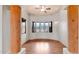 Inviting living room with wood floors, ceiling fan, and multiple windows offering natural light at 40108 N 2Nd Way, Phoenix, AZ 85086